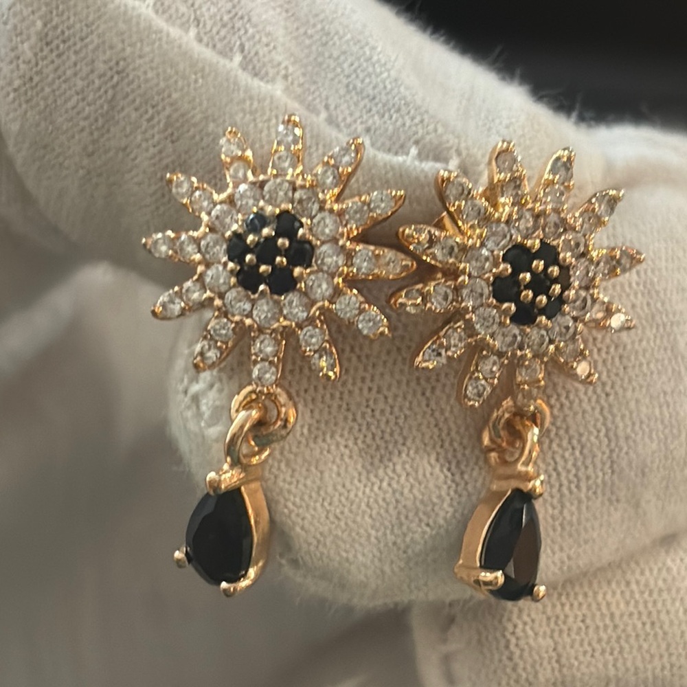 Rose gold plated zirconia starburst dangle earrings